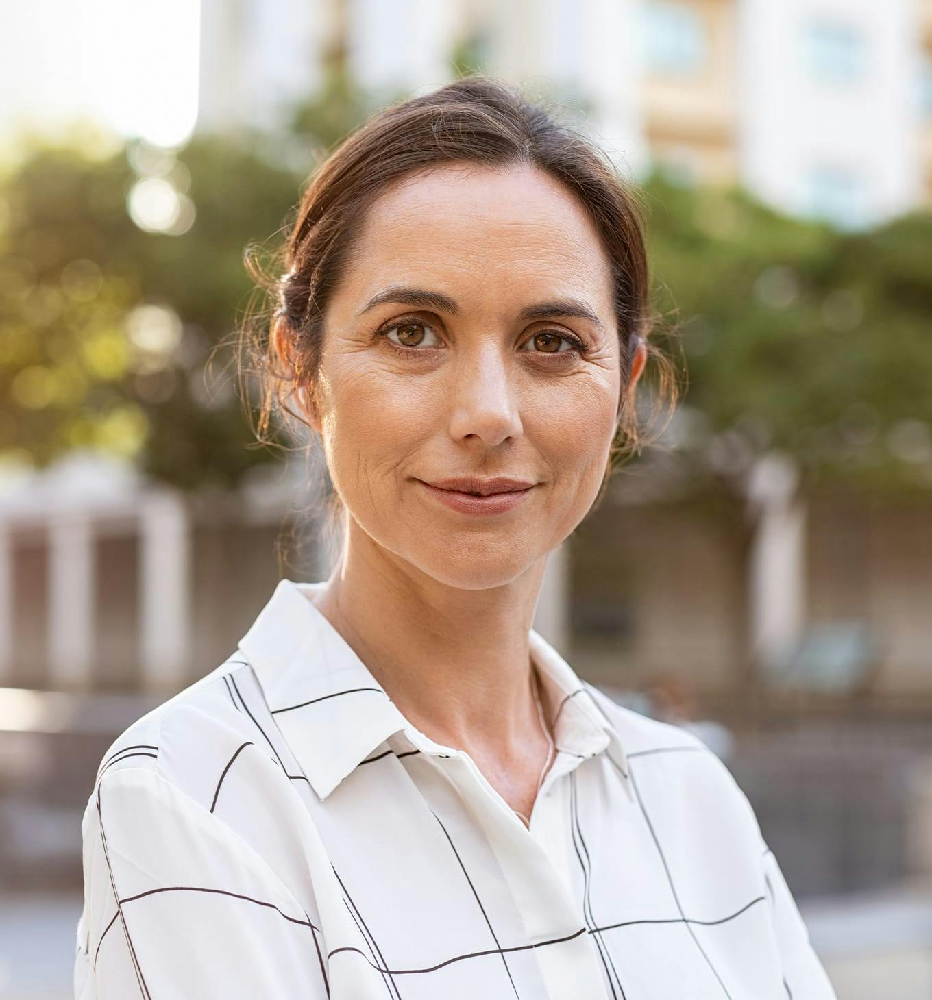 woman smiling outside