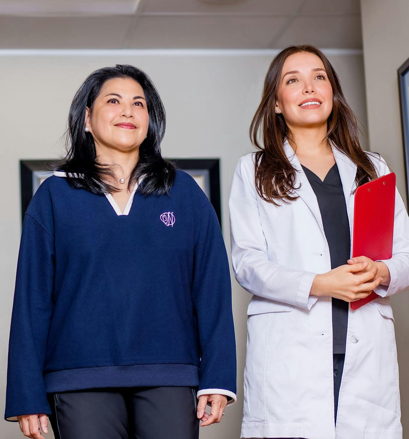 doctor standing with patient