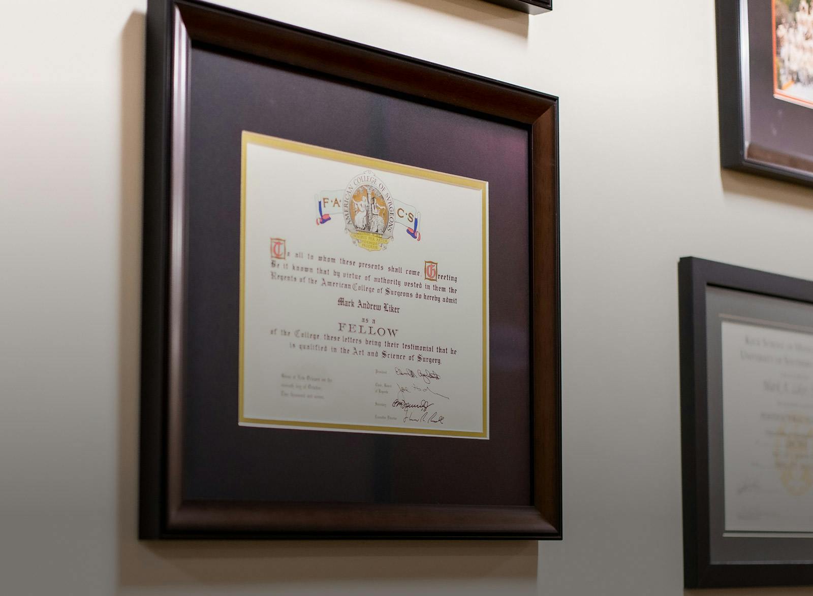 framed award on a wall