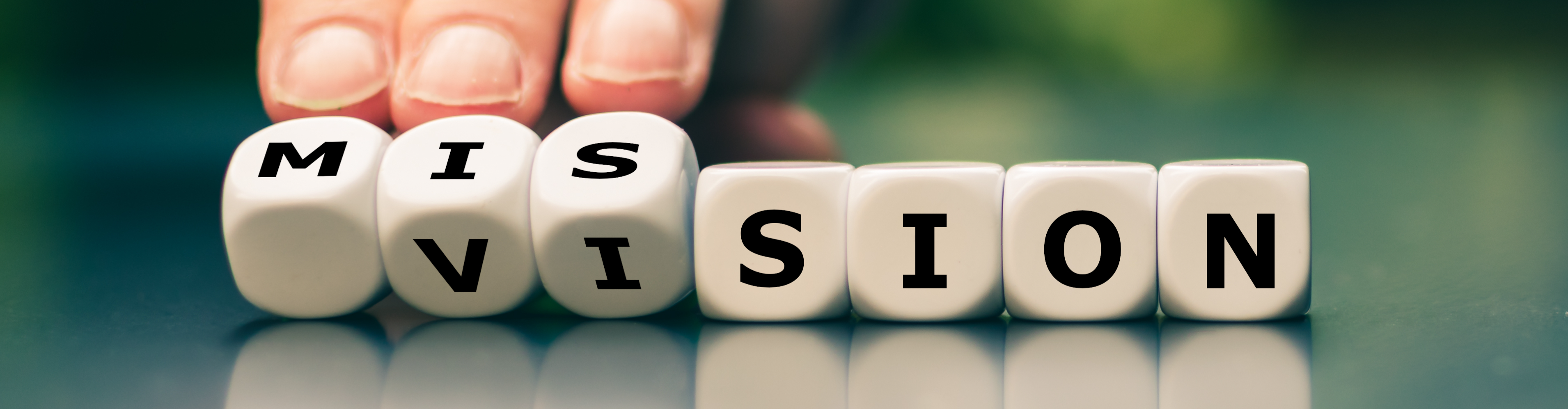 Dices with Mission and vision text