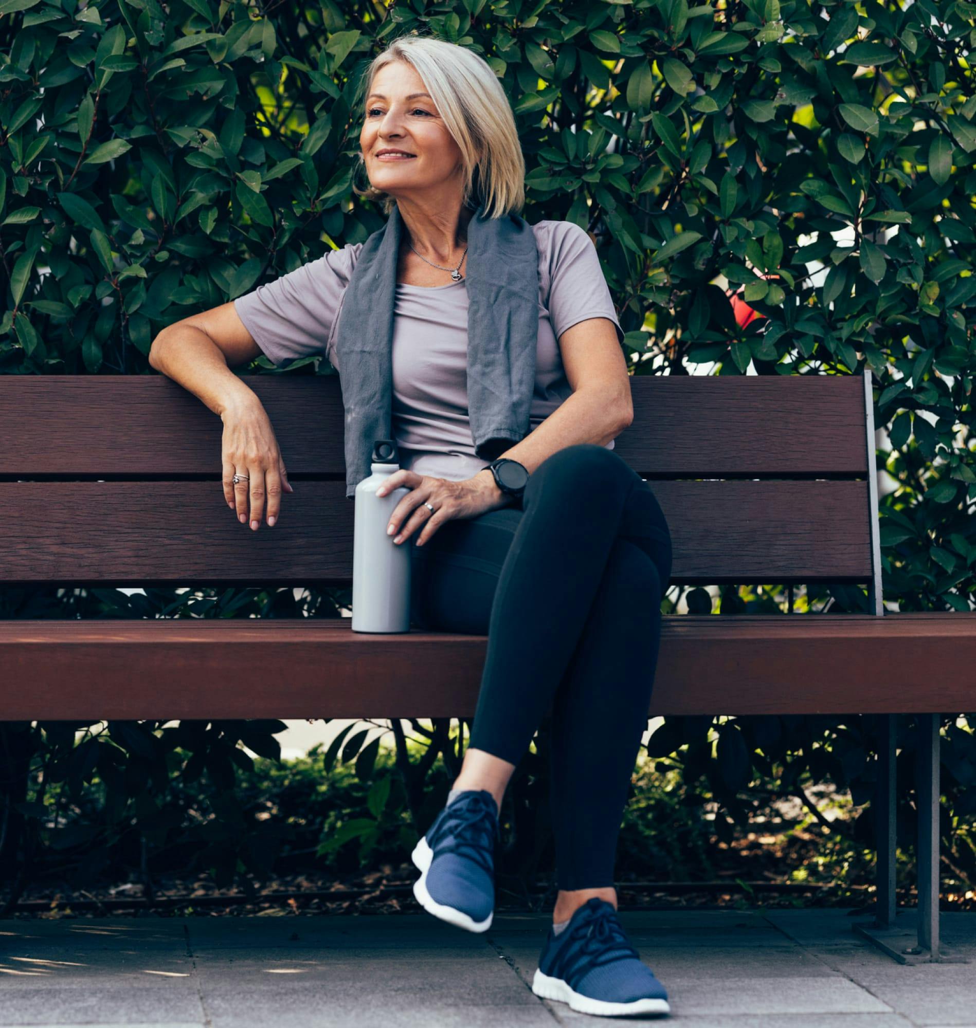 Woman sitting on a park bench