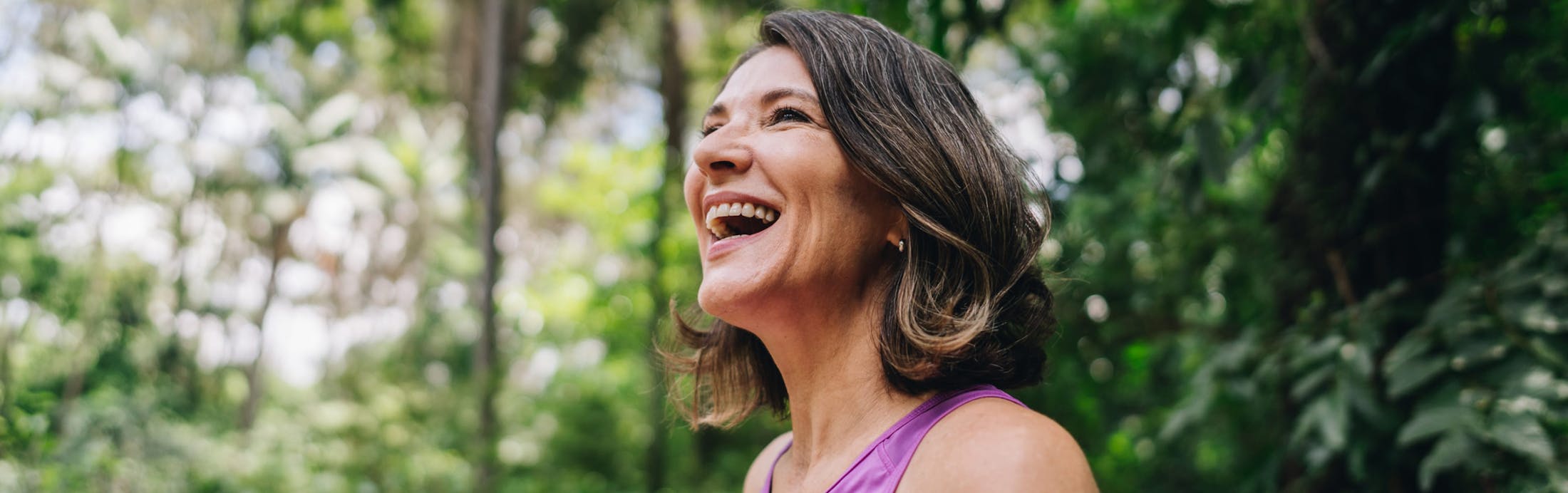 Woman looking up and smiling