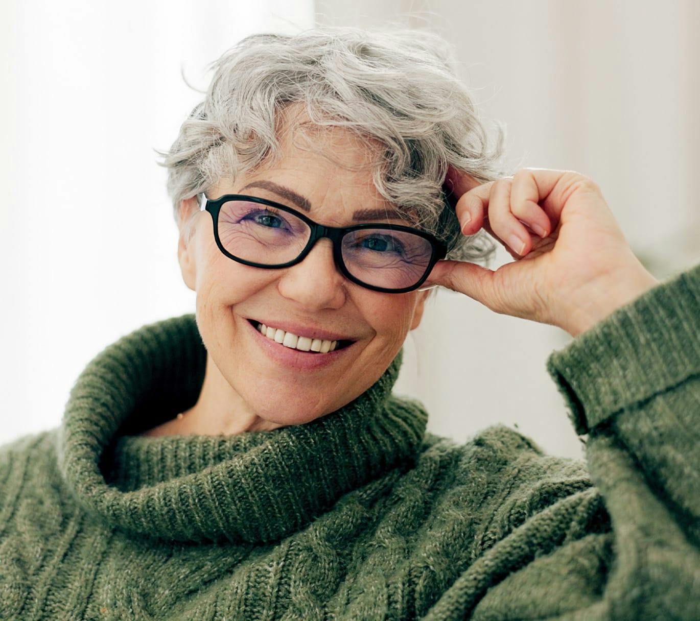 woman in knit green sweater
