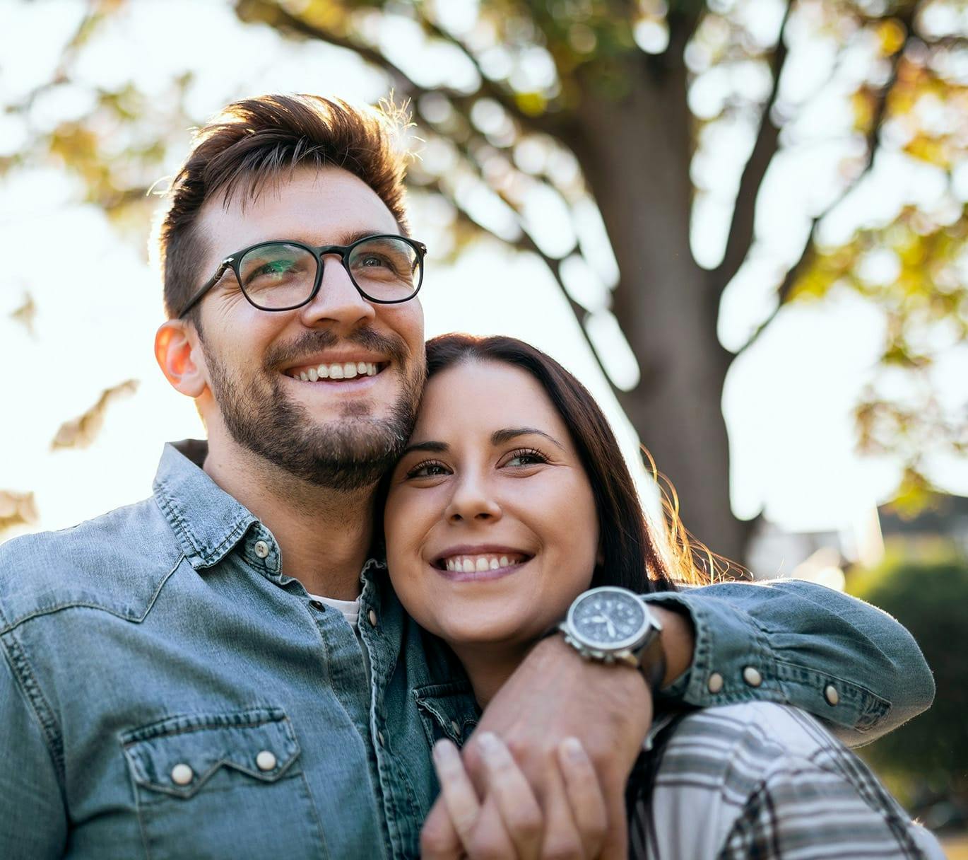 couple hugging outside