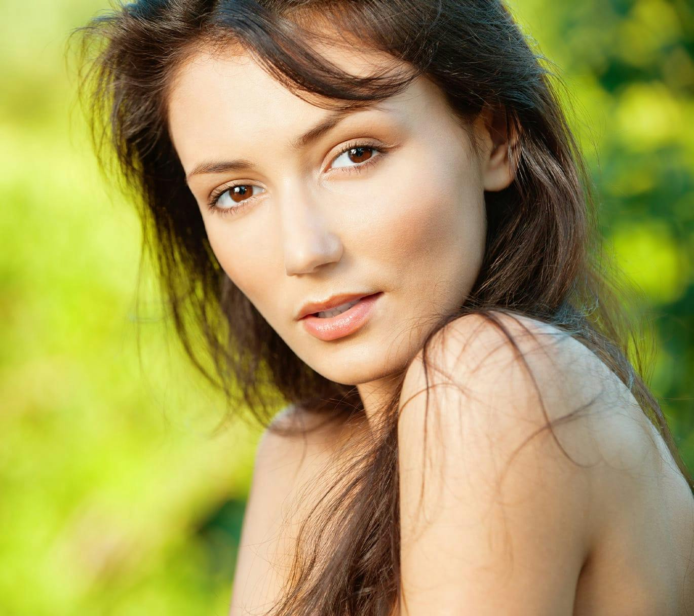 woman outside with tousled hair