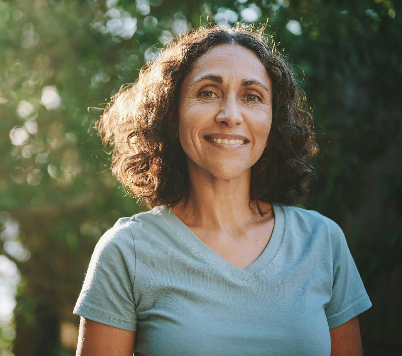 woman smiling outside