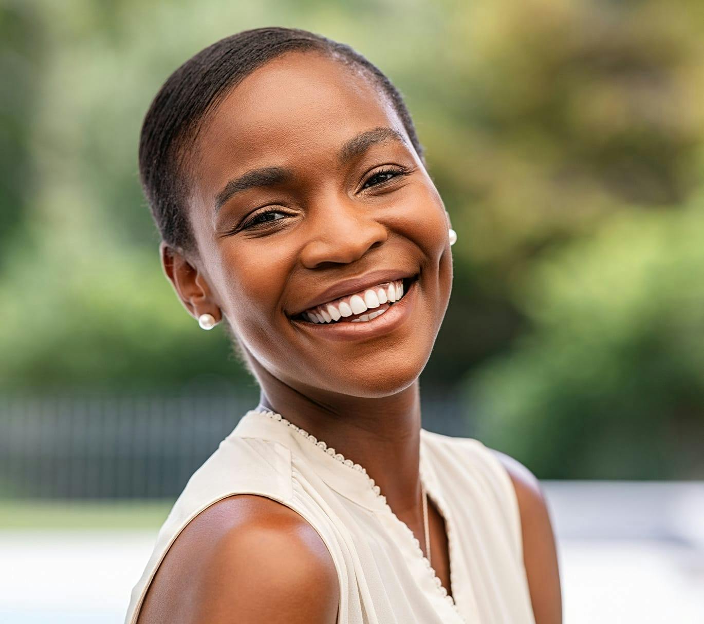 woman smiling outside