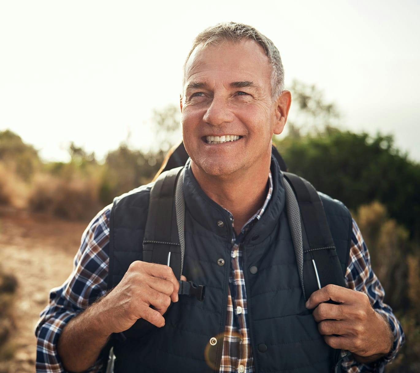 smiling man on hike