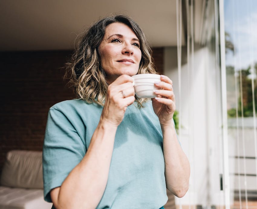woman enjoying coffee