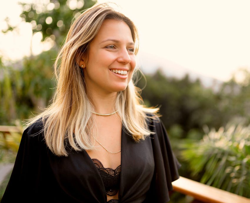 woman smiling outside