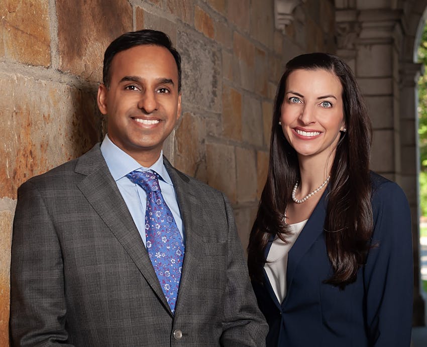 doctors next to brick wall