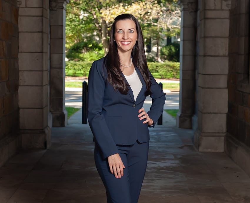 doctor in a stone archway