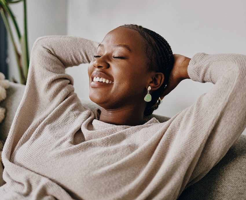 woman leaning back with eyes closed