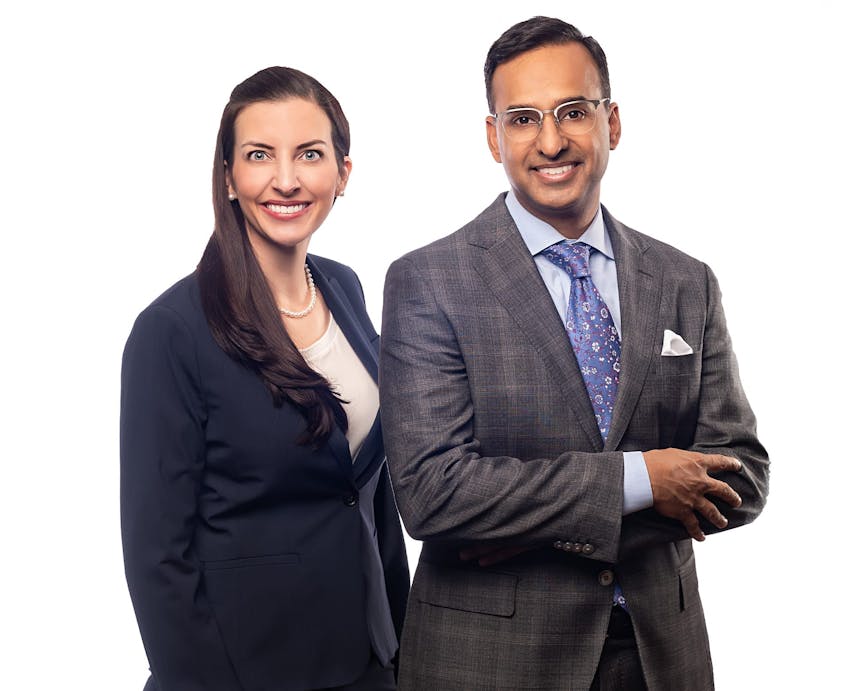 doctors standing in front of a white background