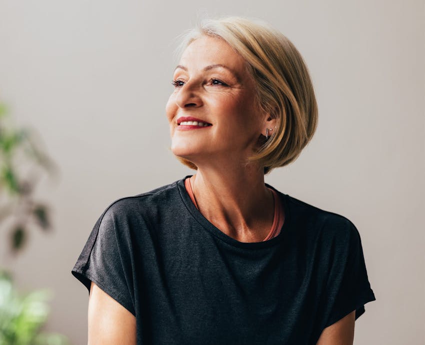 woman smiling with head turned