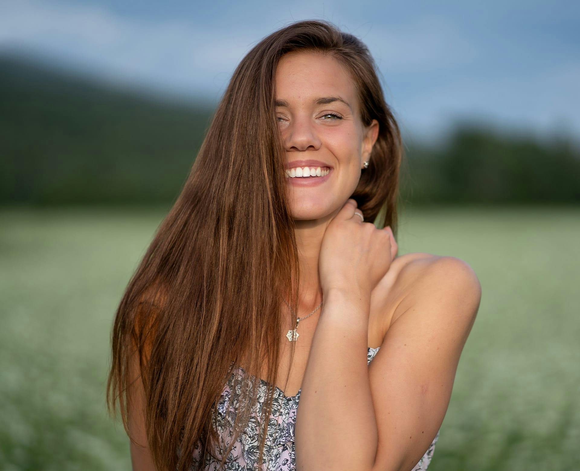 woman smiling outside
