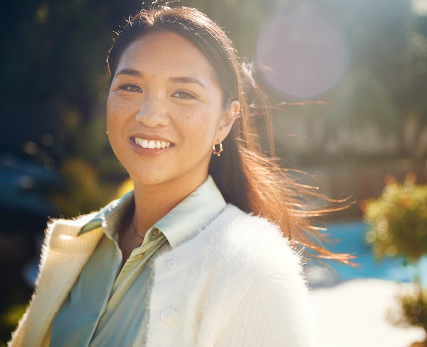 woman smiling outside