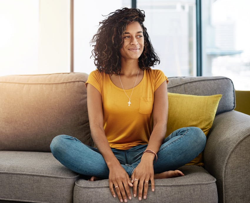 women sitting on a couch