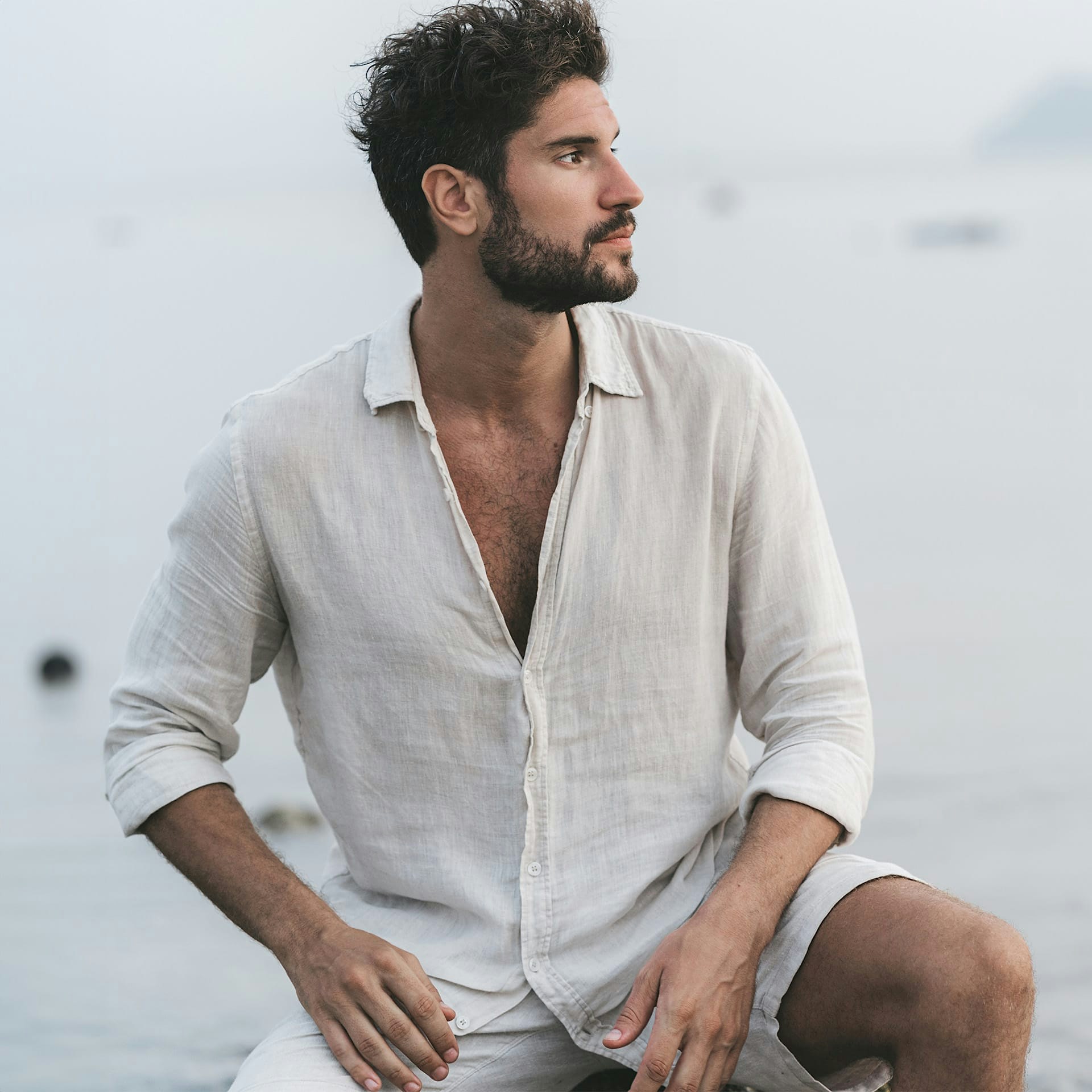 man in a linen button up shirt