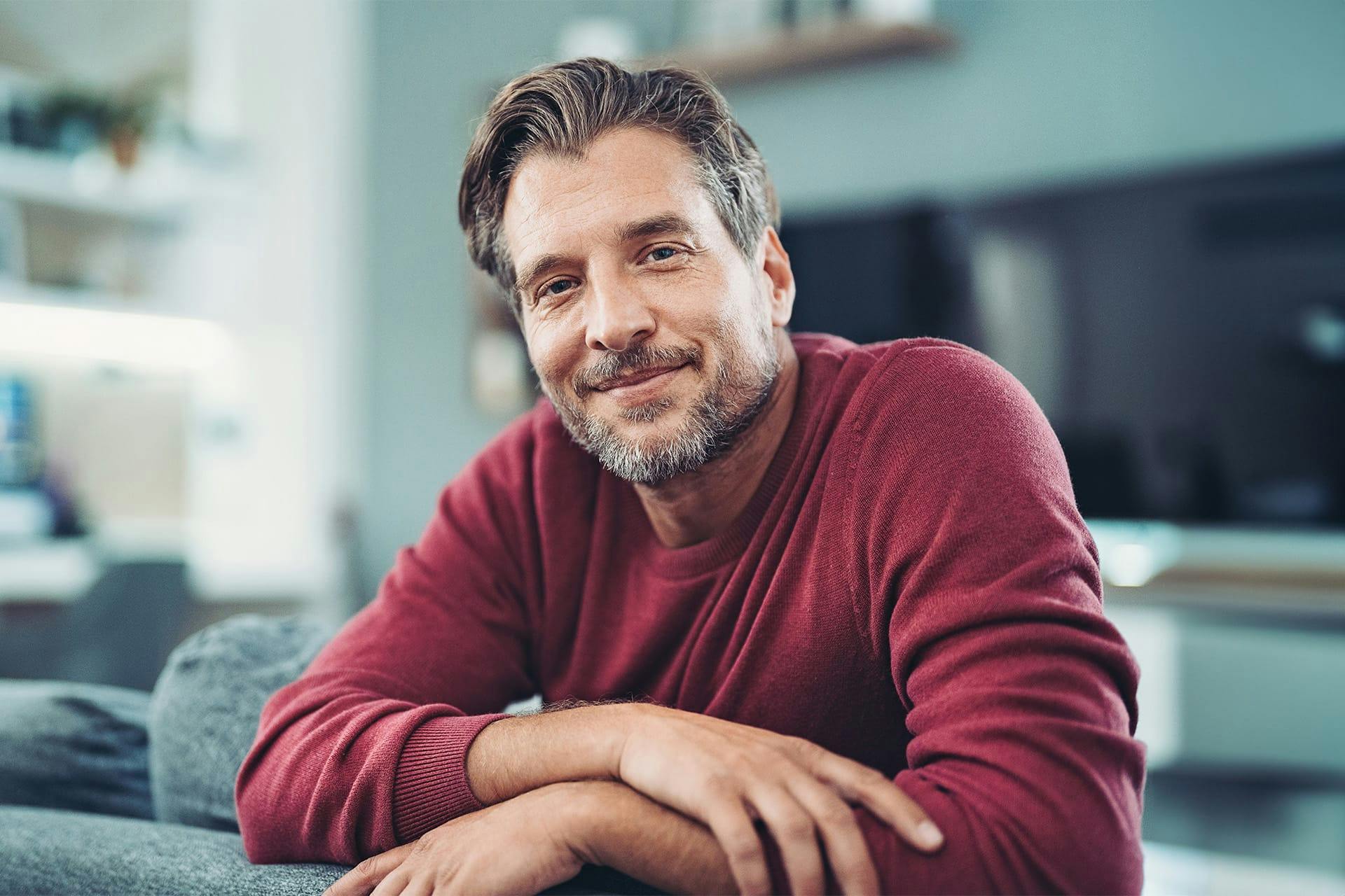 man wearing a red sweater