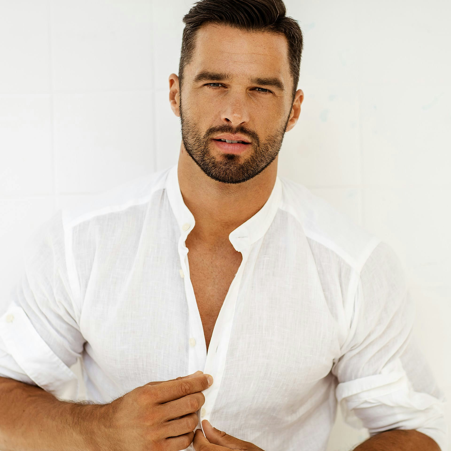 man wearing a white button up shirt