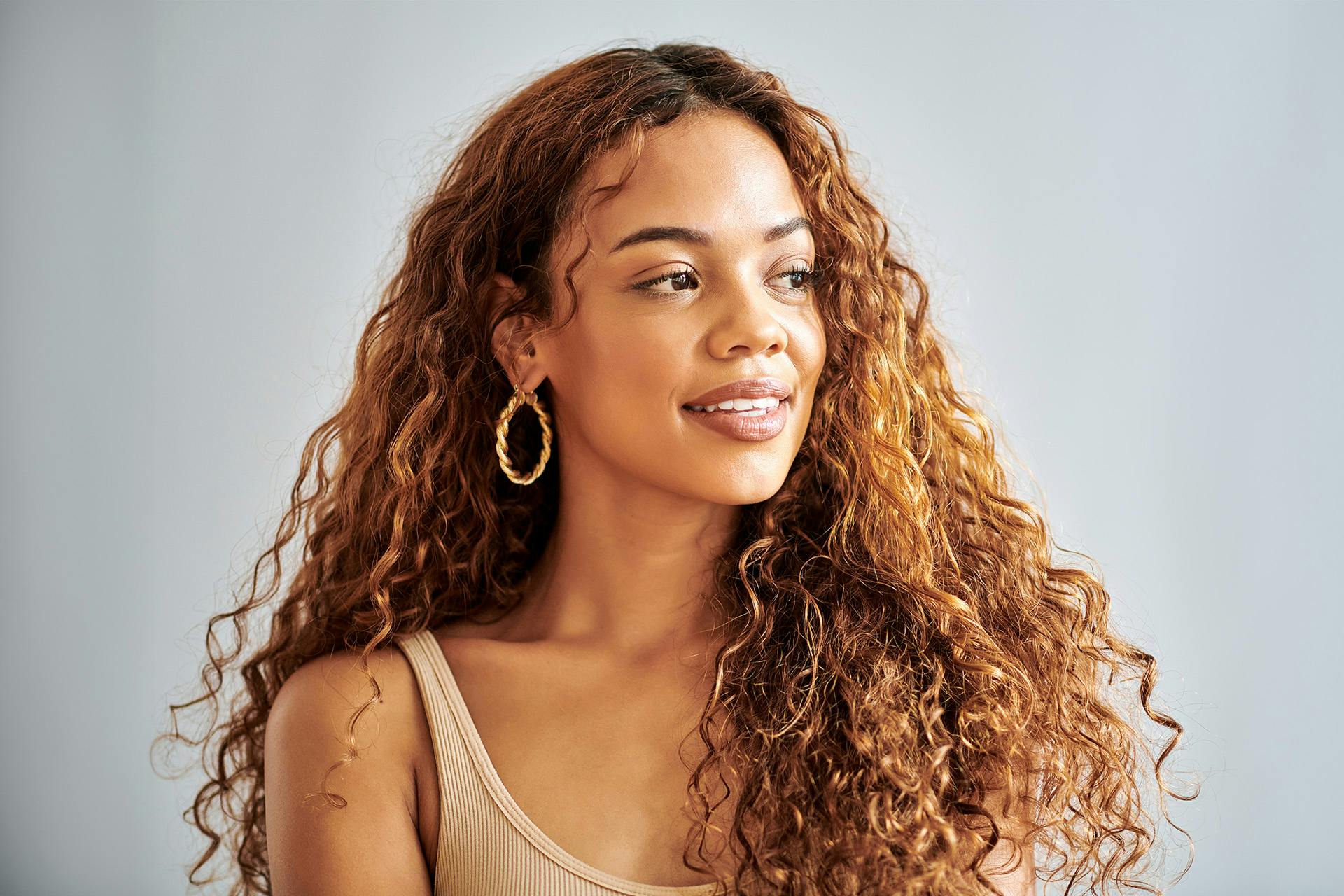 woman with curly golden brown hair