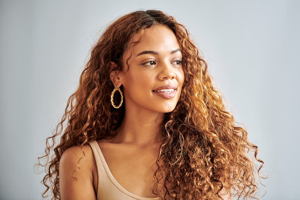 woman with curly golden brown hair