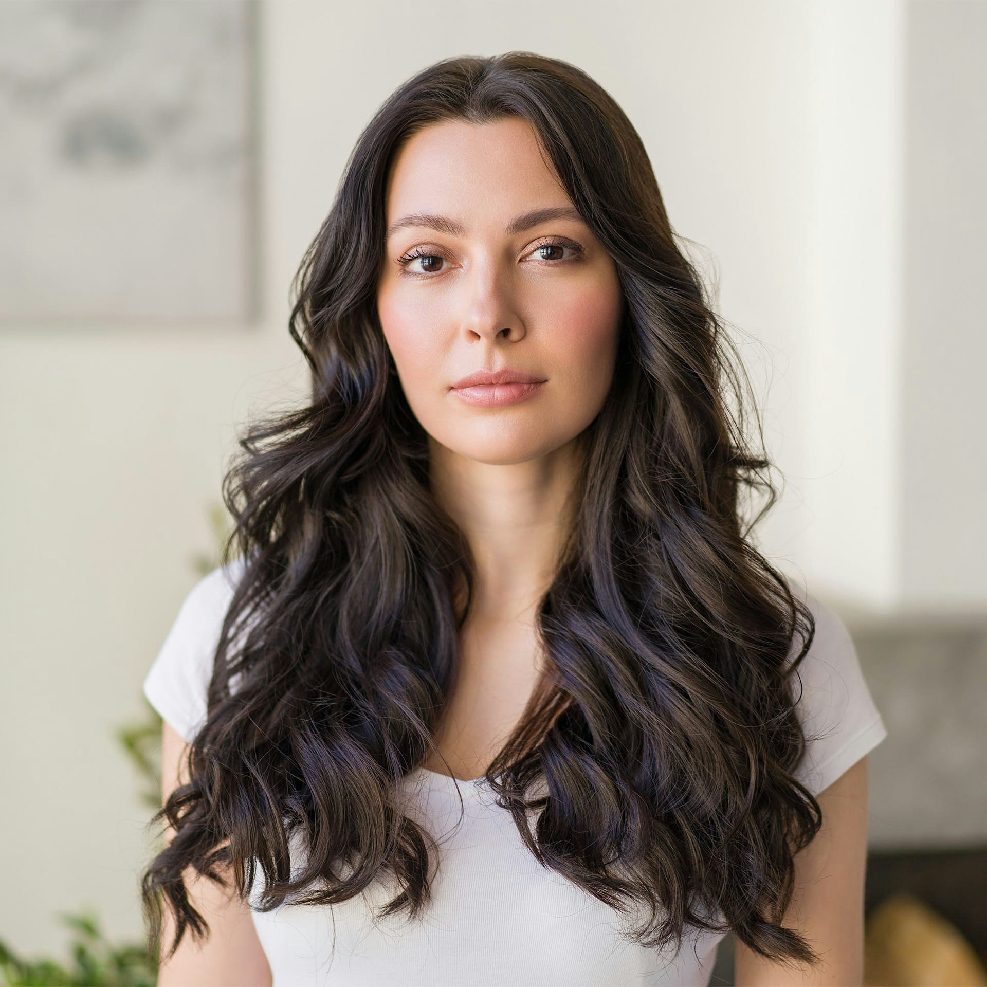 woman with long curly dark hair