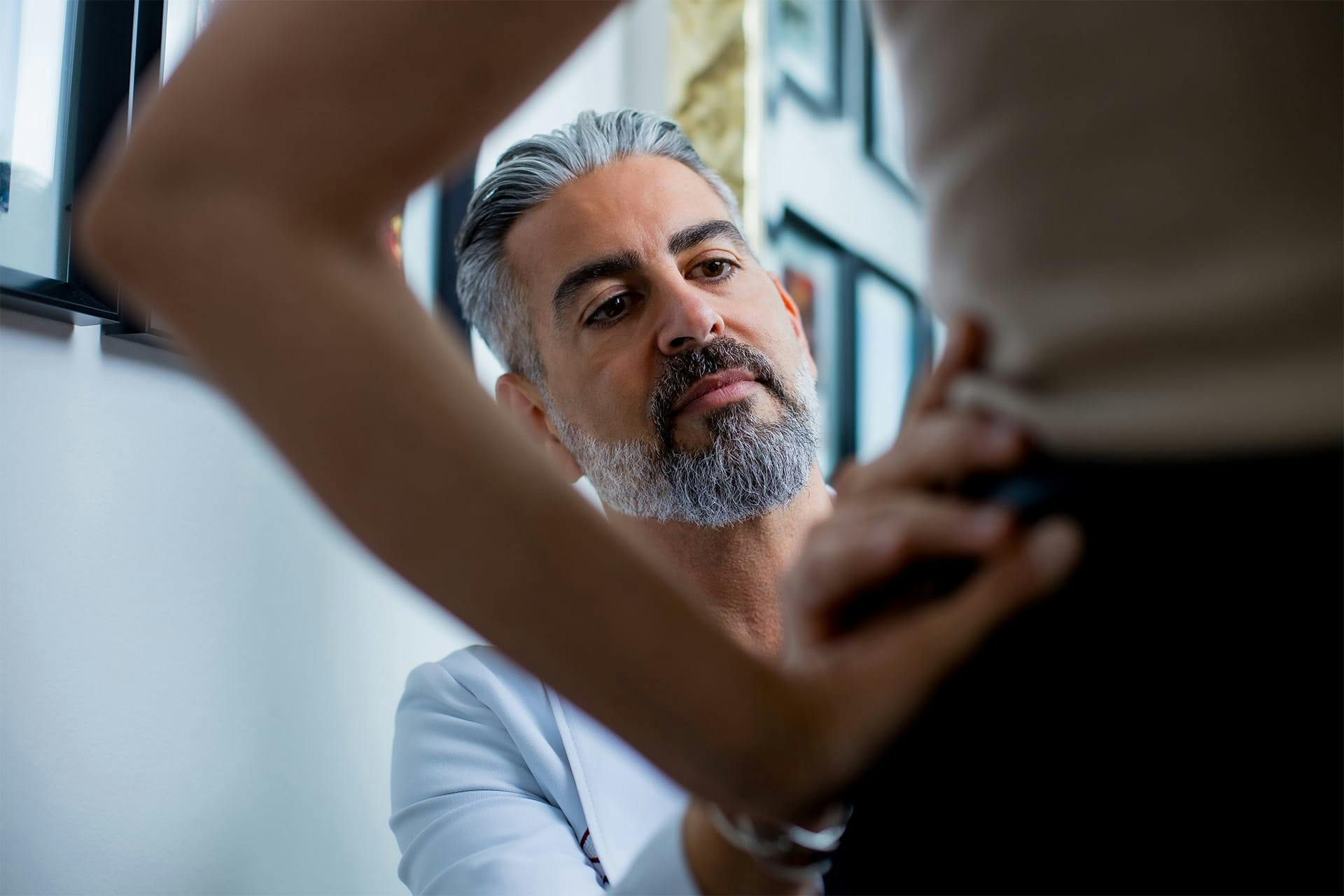 Dr. Firouz with a patient