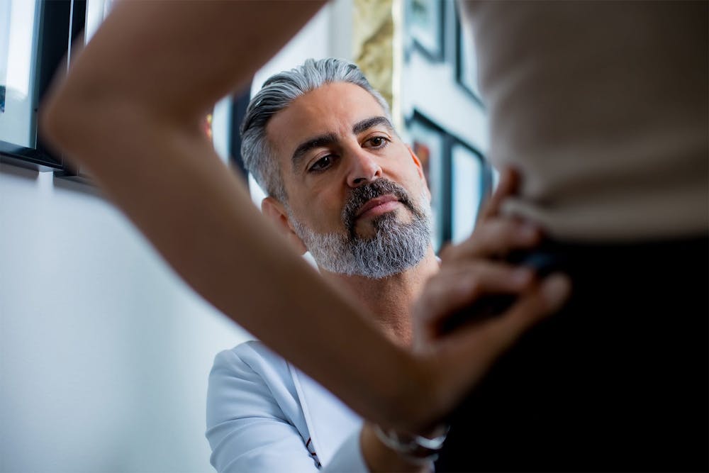 Dr. Firouz with a patient