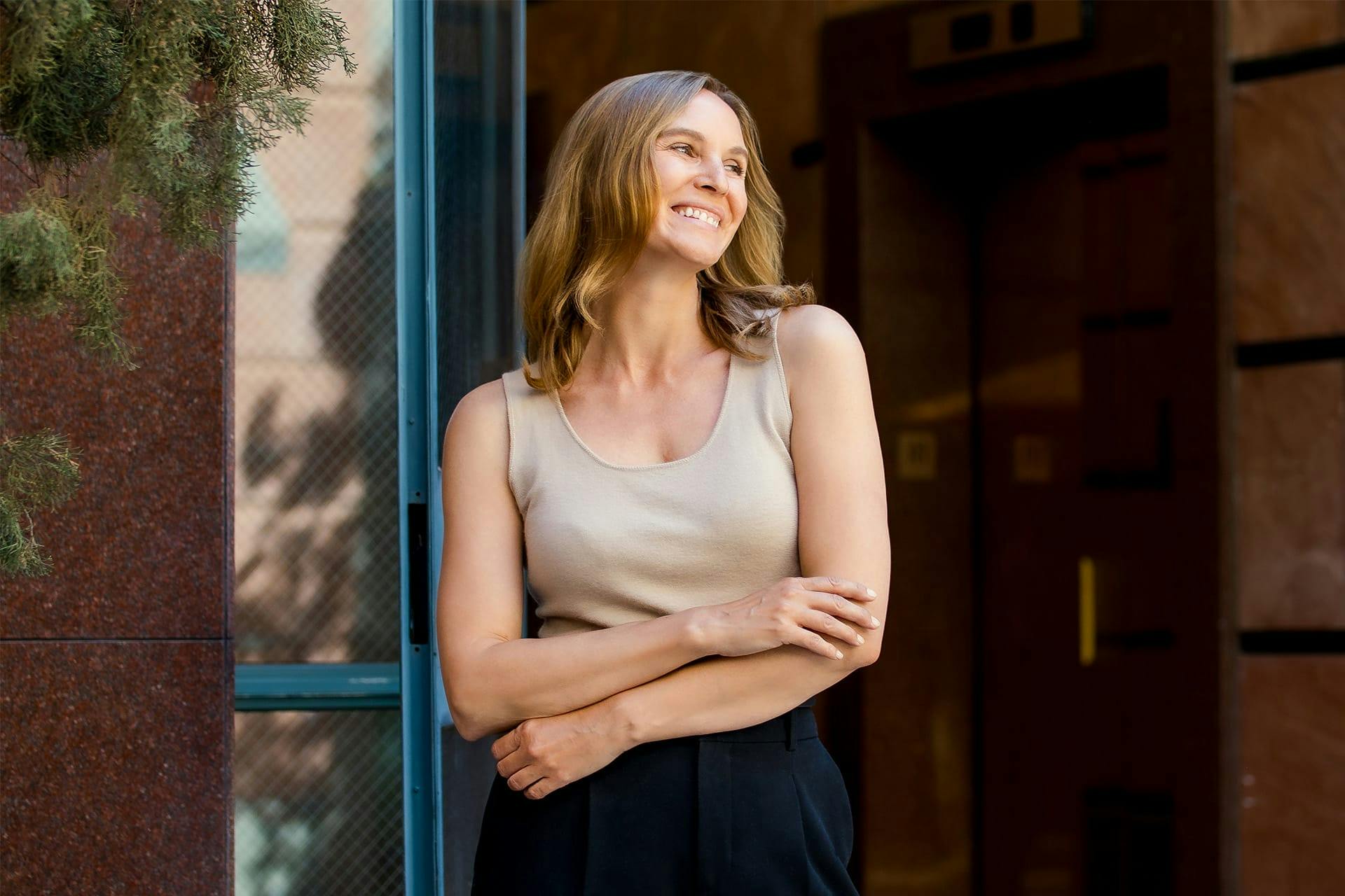 woman outside smiling