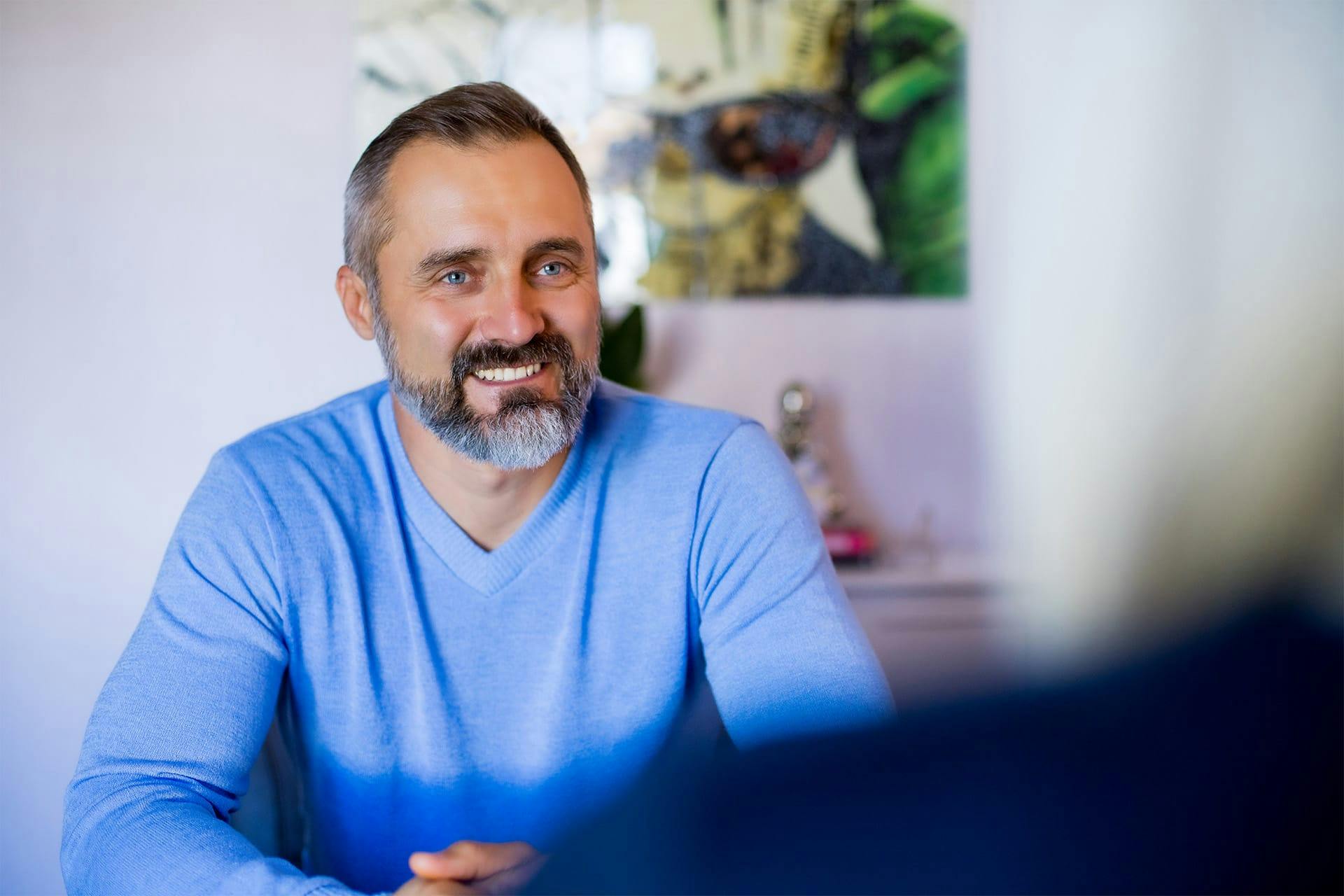 man in a blue shirt