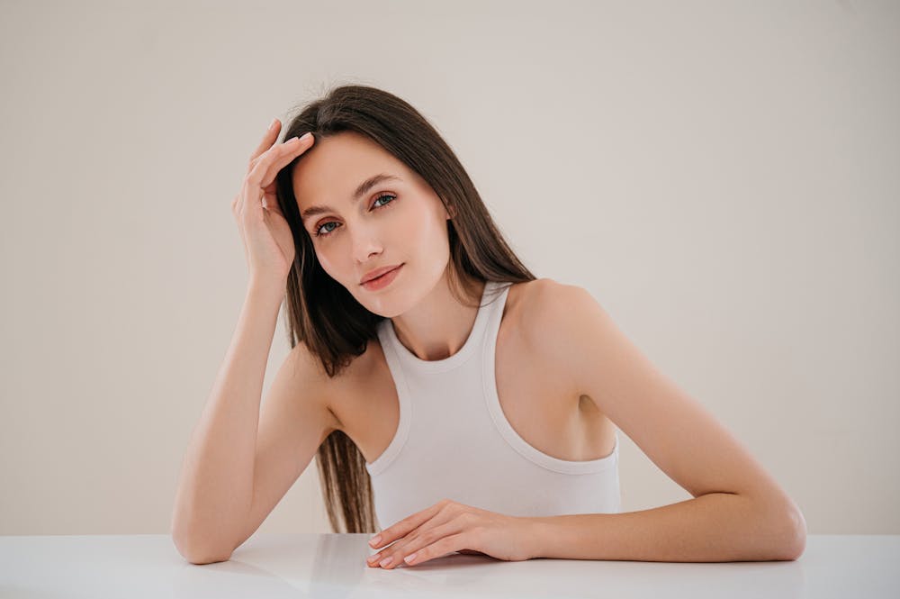 Woman resting her face on her hand