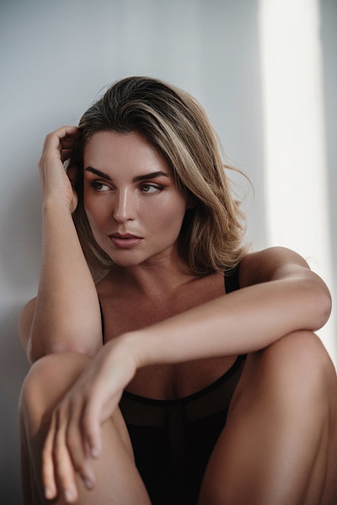 Woman sitting on the floor