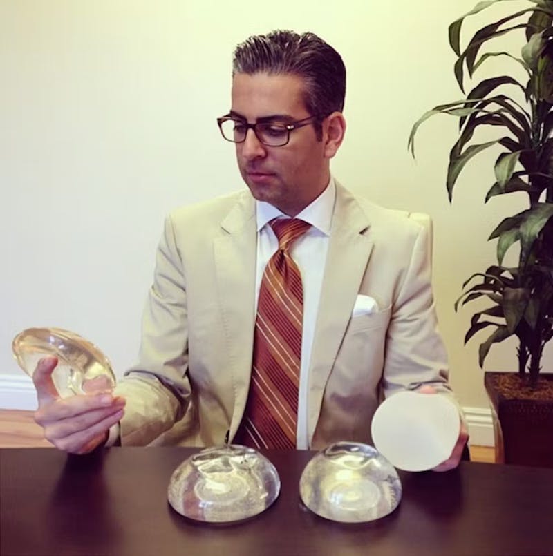Dr. Firouz with breast implants