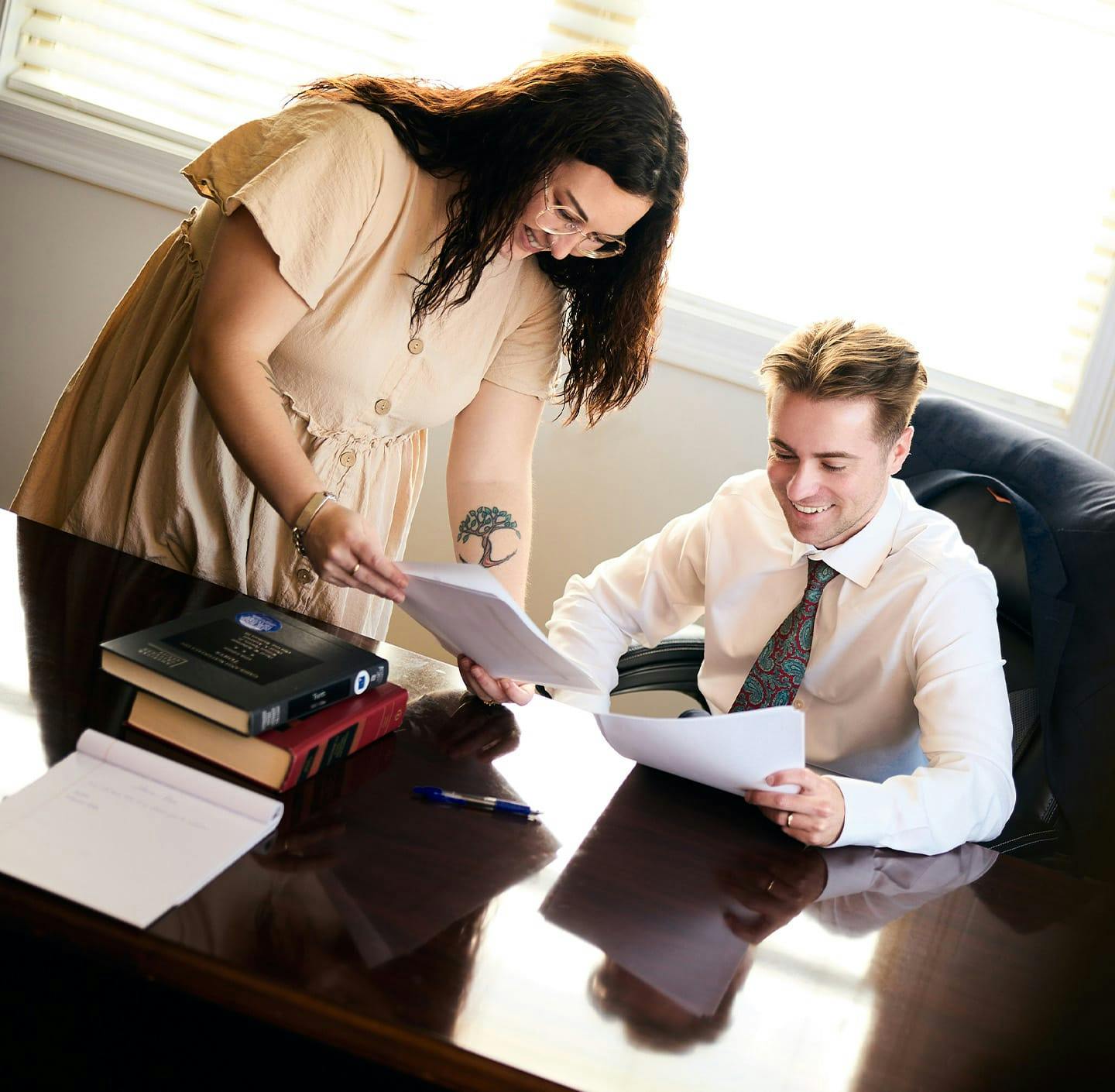 Caleb reviewing document