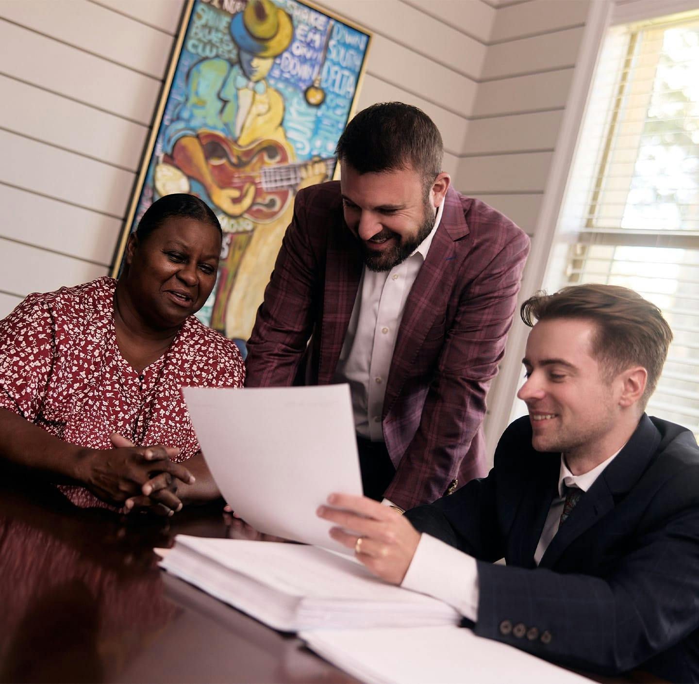 Mike and Caleb with client