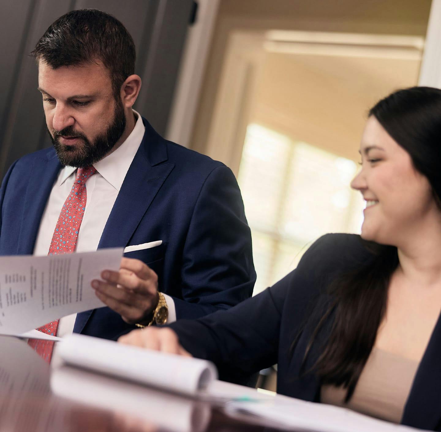 Mike and Tes reviewing documents