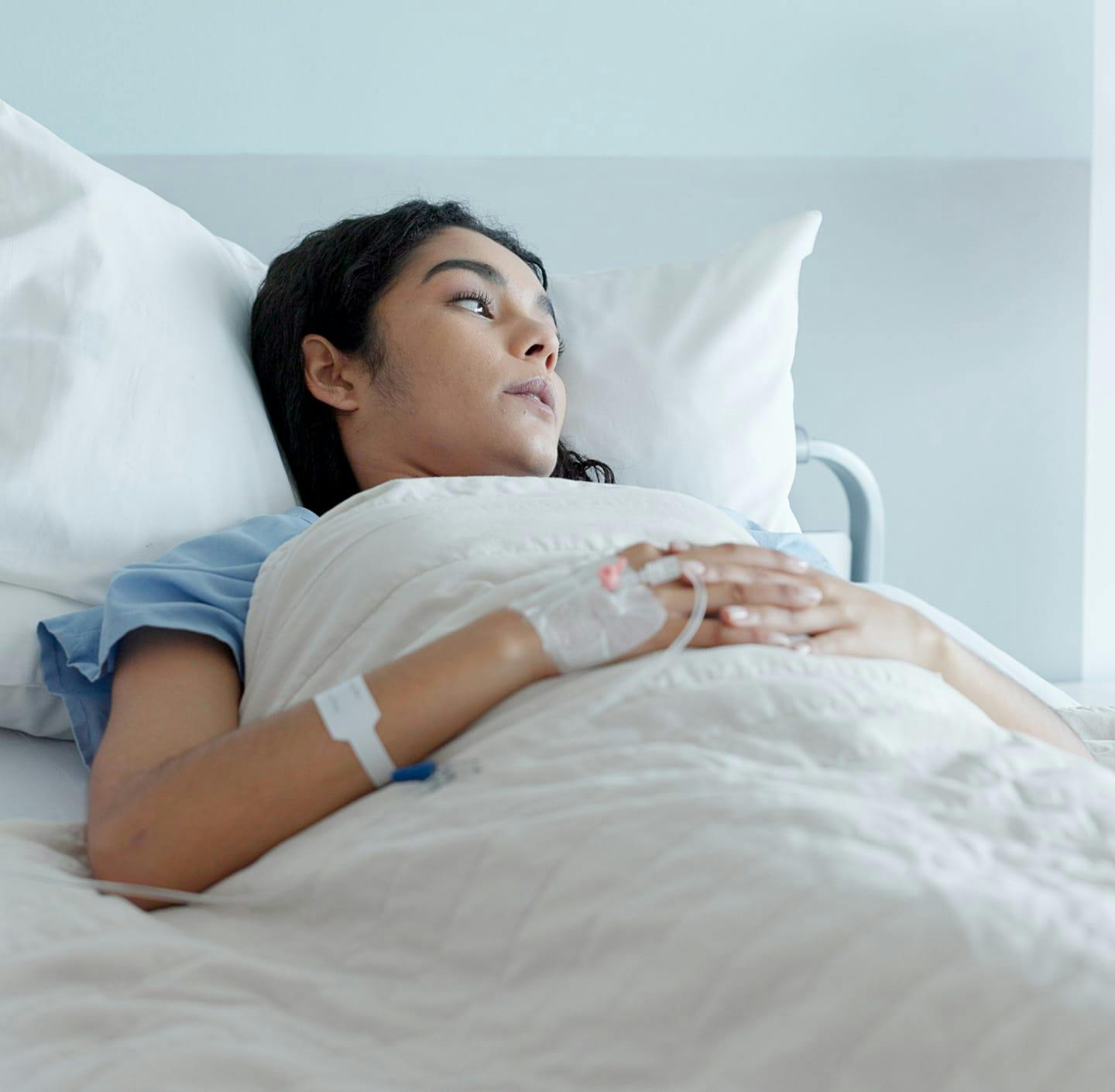 Woman in hospital bed
