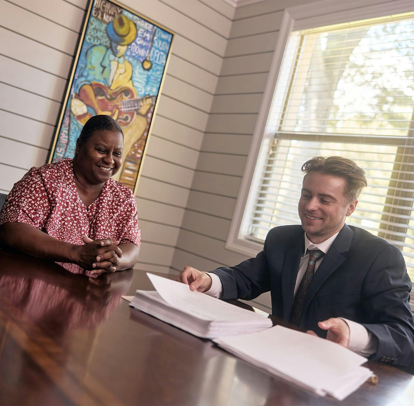 Caleb speaking with client