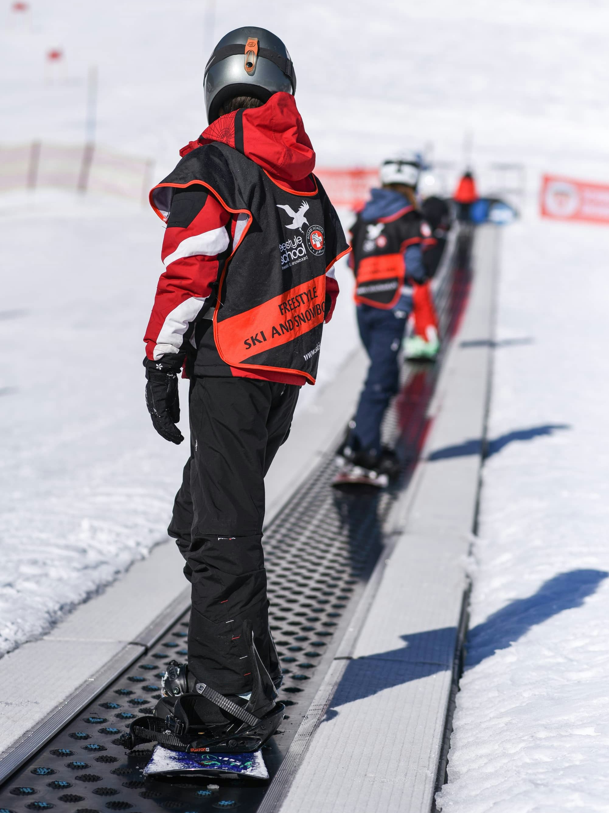 Snowboardunterricht Kinder in Kinder Skischulgebiet Celerina