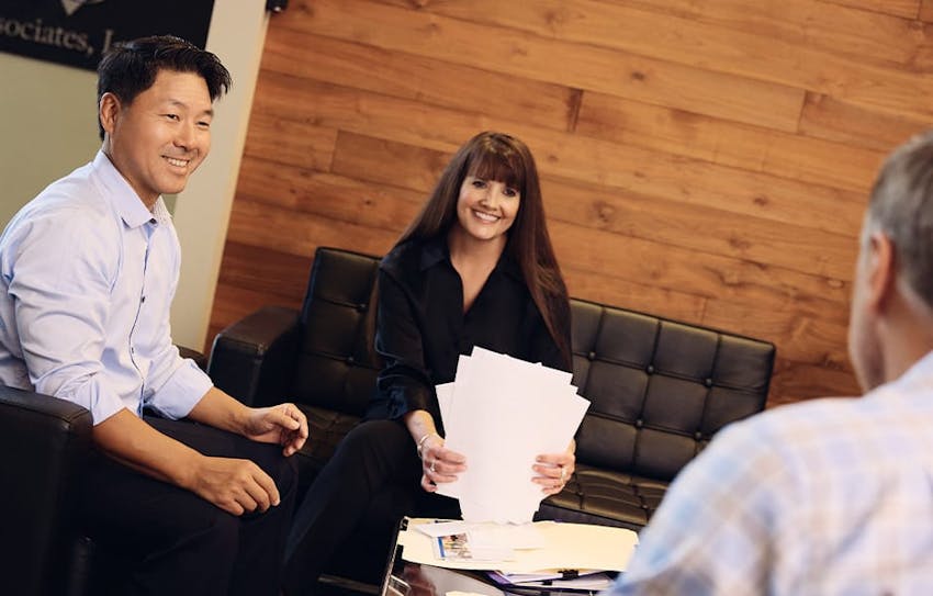 Rick Park and Angel Chenaur speaking to client together