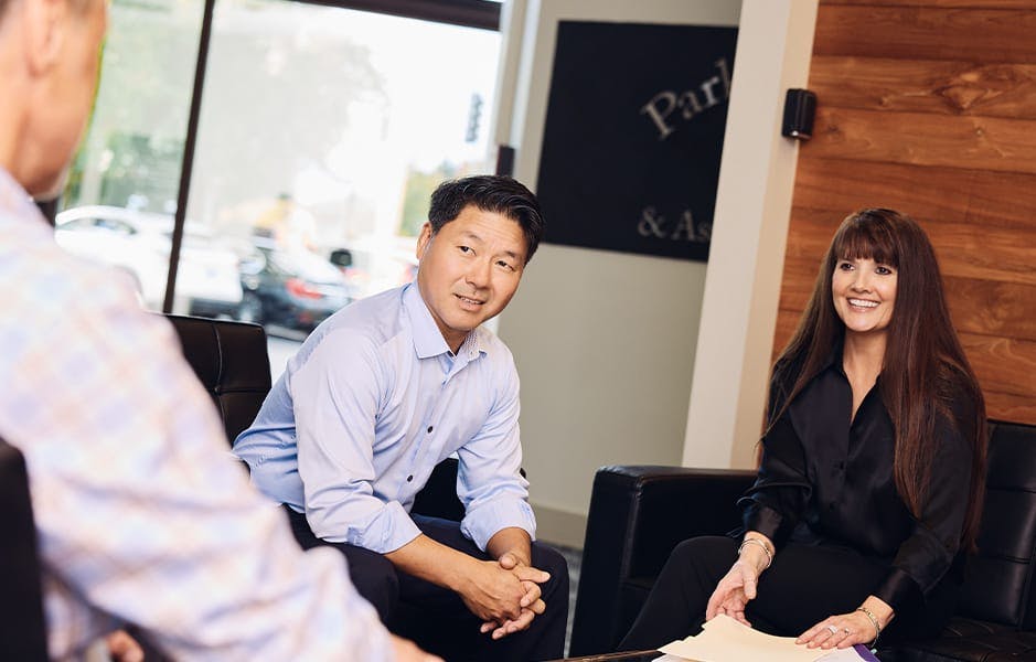 Rick and Angel sitting down with client