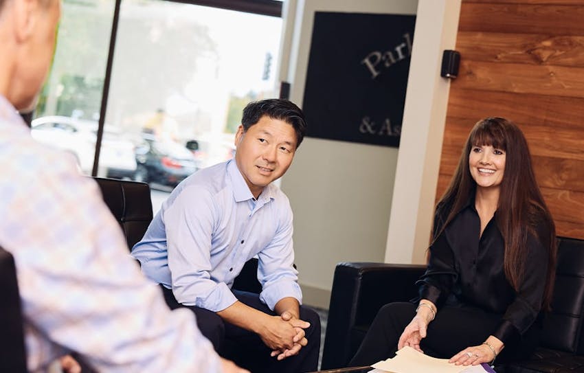Rick and Angel sitting down with client