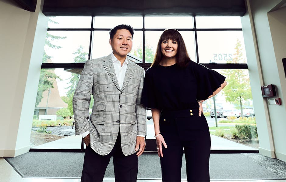 male and female attorney standing together