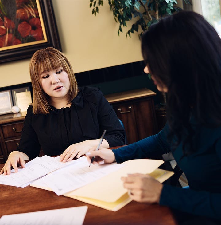 attorneys looking at paperwork
