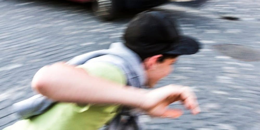 pedestrian avoiding injury by car