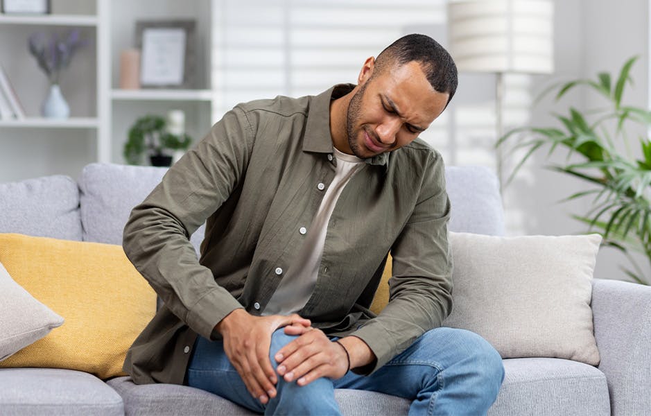 man told his knee cap as he sits down