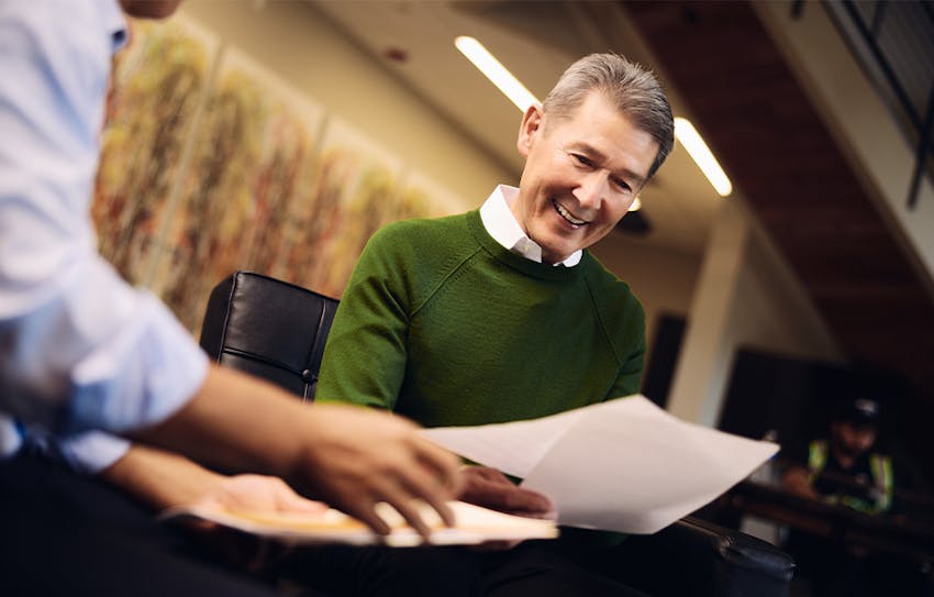 man in green sweater