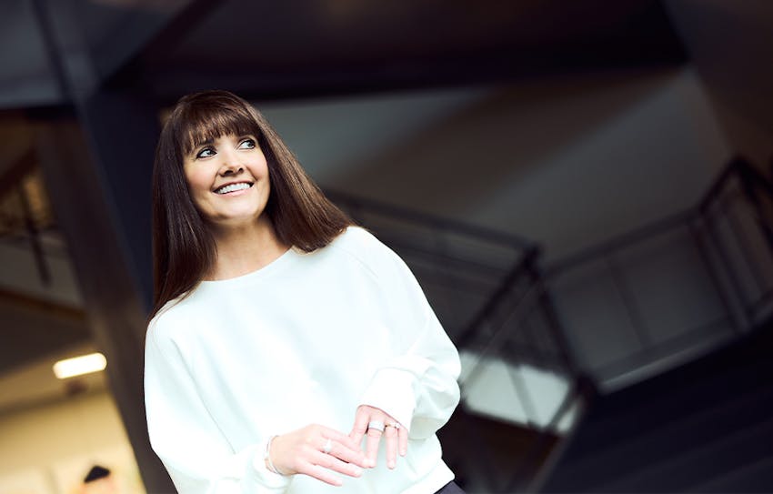 Angel in white shirt smiling
